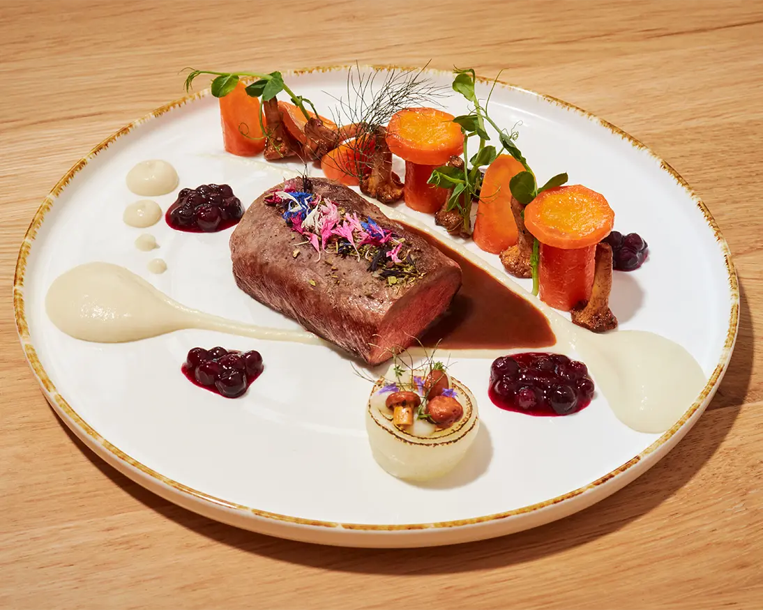meat dish with mashed potatoes and a forest of vegetables